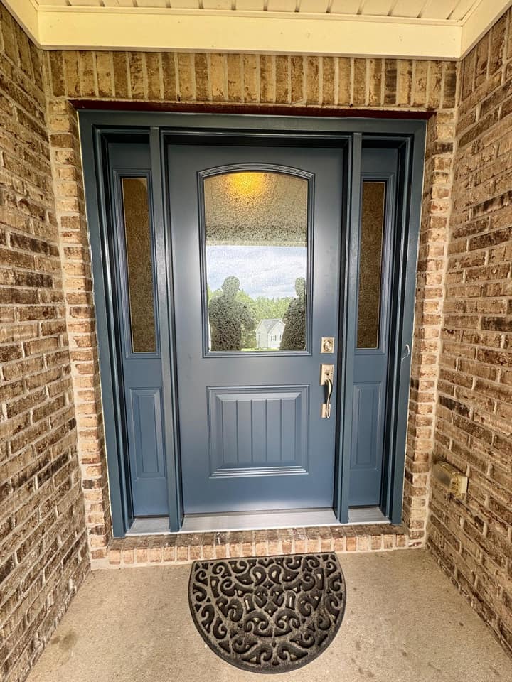 Navy entry door with half glass and sidelites